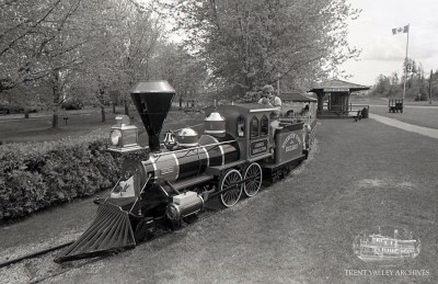 historic 1980 photo of miniature train ride by train station